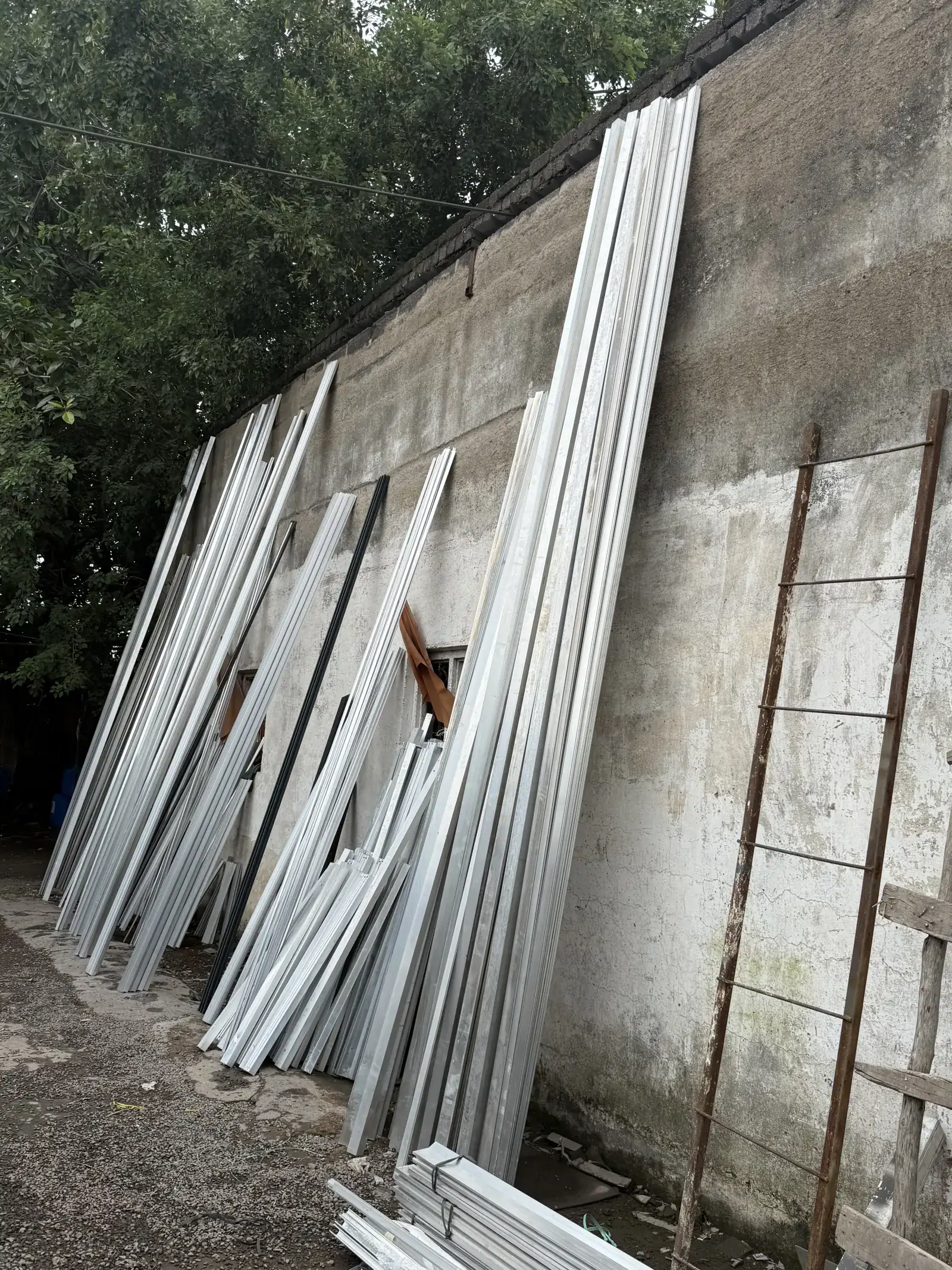 Aluminium and metal profiles stored for powder coating at the Raipur workshop