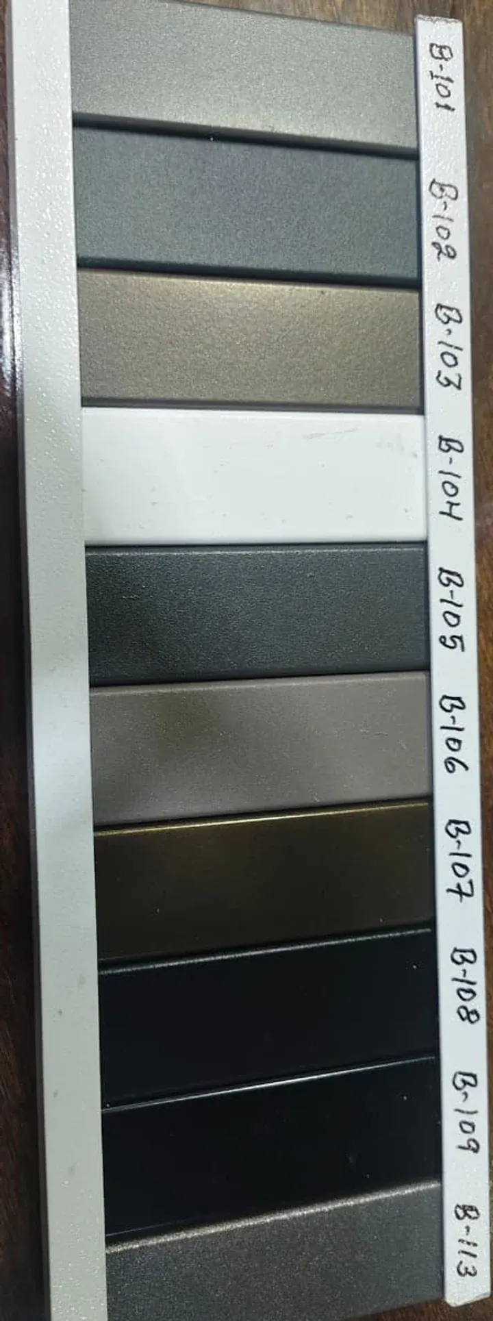 Powder coating colour sample board with labelled metal strips from Shree Balaji Coat in Raipur